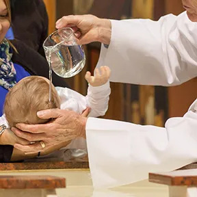 A baby being baptized 